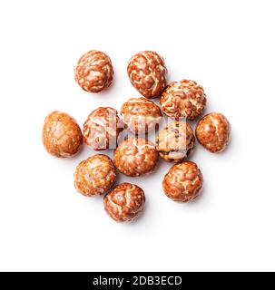 Hazelnuts with sugar icing isolated on white background. Stock Photo