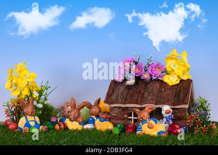 The Easter bunnies lie on the meadow Stock Photo