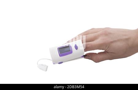 Woman using fingertip pulse oximeter isolated on white background with space for text Stock Photo