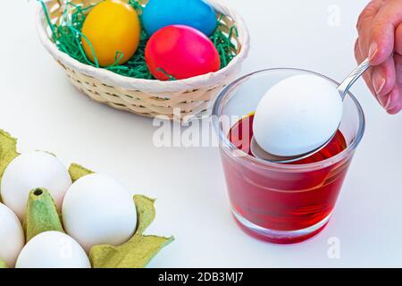 Dyeing and decorating easter eggs Stock Photo
