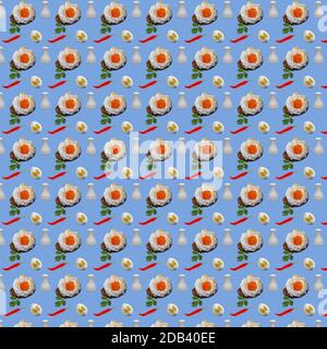 Seamless pattern with repeating breakfast objects orsini egg, whole eggs and chili peppers on a blue background Stock Photo
