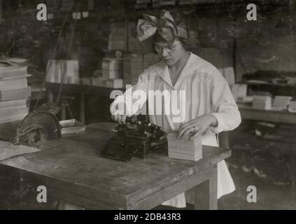Stamping labels. Boston Index Card Co., 113 Purchase Street.] Location: [Boston, Massachusetts]. Stock Photo