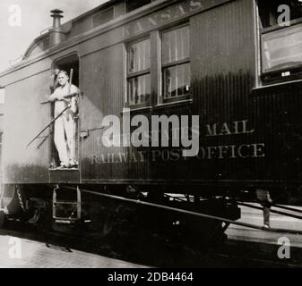 Train Postal Clerk on Railroad Car. Stock Photo