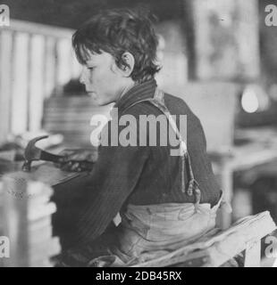 Boy making Melon Baskets, A Basket Factory,. Stock Photo