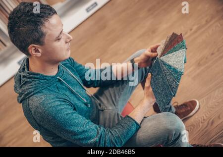 sample of colored carpets in floor shop. Stock Photo