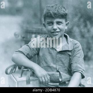 Mike, ten year old shiner, Newark, N.J. August 1, 1924. Location: Newark, New Jersey.. Stock Photo