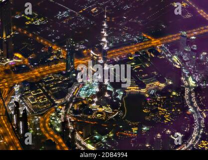 DUBAI, UAE - JANUARY 26, 2016: Top Burj Khalifa in night, Khalifa Tower known as Burj Dubai before its inauguration, is a megatall skyscraper in Dubai Stock Photo
