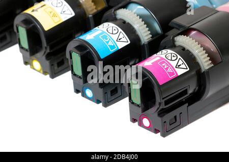 cartridges for laser printers aligned on a white background. Stock Photo