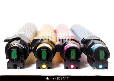 cartridges for laser printers aligned on a white background. Stock Photo
