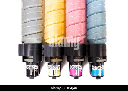 cartridges for laser printers aligned on a white background. Stock Photo