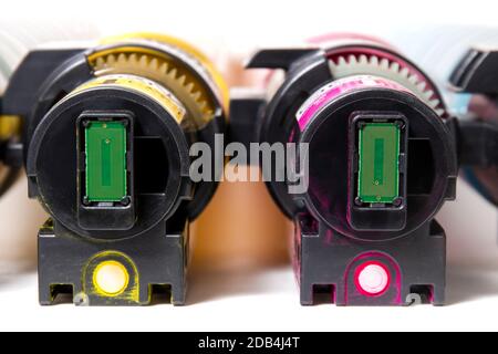cartridges for laser printers aligned on a white background. Stock Photo