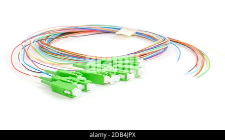 green fiber optic SC connectors fan out isolated on white background Stock Photo