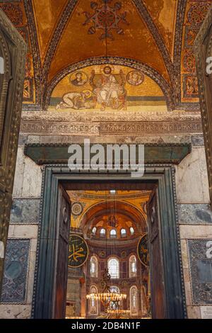 Istanbul, Turkey.  Hagia Sophia.  The Imperial Gate.  The mosaic above the door, dating from 9-10th century, shows Christ Pantocrator with an emperor Stock Photo