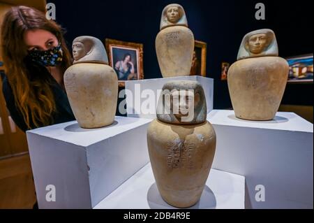 London, UK. 16th Nov, 2020. A set of four Egyptian limestone canopic jars Middle Kingdom, 12th Dynasty, circa 1939-1760 B.C., est £80-120,000 - Preview of Bonhams' Antiquities Sale. The sale will take place on 01 December online from New Bond Street. Credit: Guy Bell/Alamy Live News Stock Photo