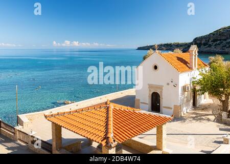 A seaside Eastern Orthodox Church near Kamari Beach in Gerani, Rethymno Municipality, Crete, Greece Stock Photo