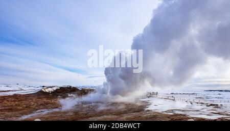 water vapour comes out of the ground in winter landscape Stock Photo