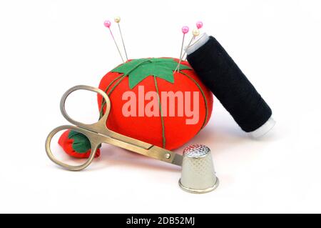 An isolated set of sewing items over a white background. Stock Photo