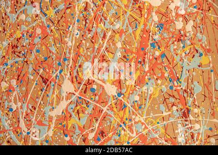 different colored spots on a yellow background created by irregular application of color. Stock Photo