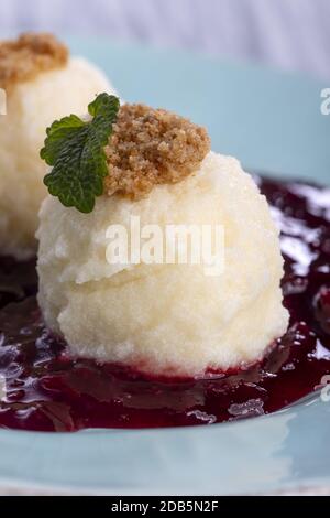 austrian curd noodles on plum sauce Stock Photo