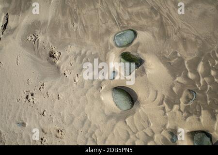 Top down detailed shoot of coastal rocks and sand Stock Photo