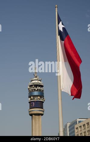 Entel Tower and flag of Chile in the Libertador Bernardo O'Higgins Avenue. Santiago de Chile. Chile. Stock Photo