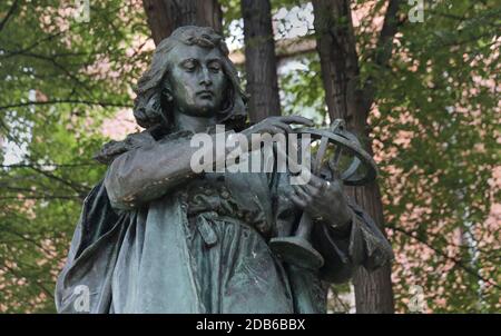 Cracow. Krakow. Poland. Nicolaus Copernicus Statue with astrolabe in hands in front of the Jagiellonian University. Stock Photo