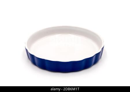 Blue porcelain ramekin on a white background Stock Photo