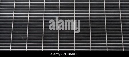 wide grey steel grid texture useful as a background Stock Photo