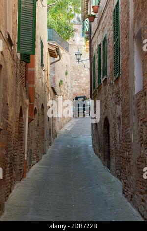the narrow street  in the Tuscan town Stock Photo