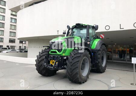 New York, United States. 15th Nov, 2020. A DEUTZ-FAHR 9340 TTV Warrior tractor is parked in front of the the Solomon R. Guggenheim Museum on 5th Avenue in New York on Nov. 15, 2020. The tractor is the entrance to Countryside, The Future, exhibition organized in collaboration with architect Rem Koolhaas and Samir Bantal, director of AMO, the think tank of the Office for Metropolitan Architecture. The exhibition runs until Aug. 14, 2020. (Photo by Samuel Rigelhaupt/Sipa USA) Credit: Sipa USA/Alamy Live News Stock Photo