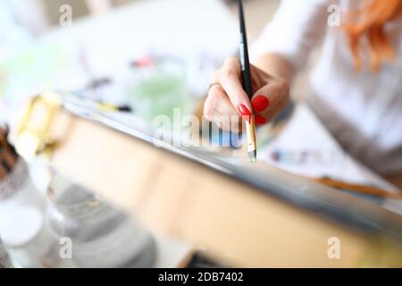 Female hand with red nails Stock Photo
