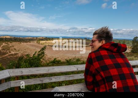 Hiker admiring view ofÃ‚Â Sleeping Bear Dunes NationalÃ‚Â Lakeshore, Empire, Michigan, USA Stock Photo