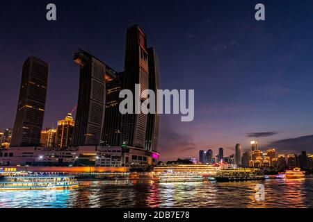 Chongqing, China - August 2019 : Night view of the modern commercial and business building, Raffles City Chongqing building, called also The Crystal, Stock Photo
