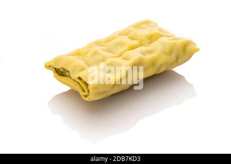 Single swabian dumpling maultasche ravioli white isolated Stock Photo