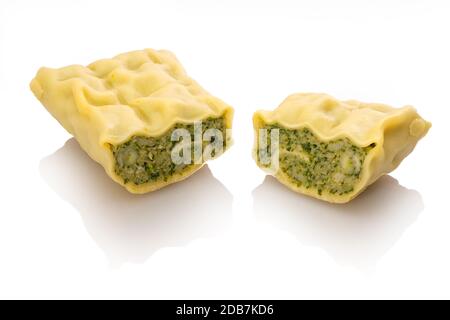 Single sliced swabian dumpling maultasche ravioli white isolated Stock Photo