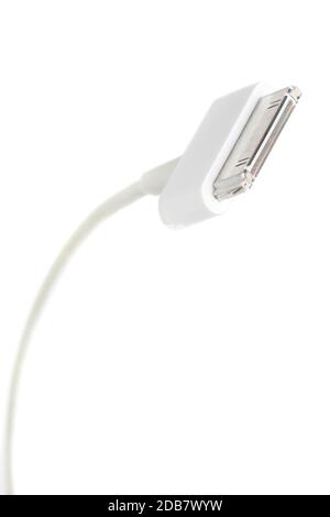 Detail of the head of a 30-pin white usb cable Stock Photo