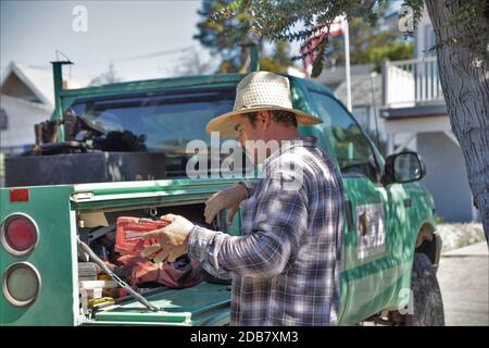 Hispanic man working in construction site in California Stock Photo
