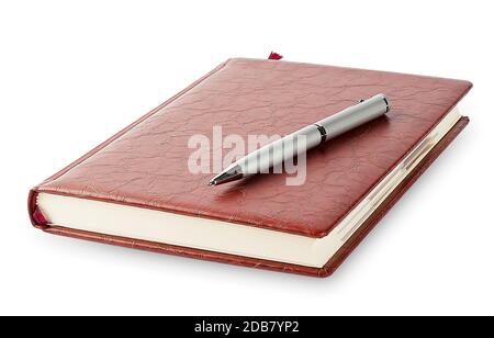 Diary with a pen lying on it isolated on a white background Stock Photo