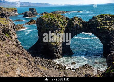 Gatklettur - Arch Rock - cliff with natural arch near Arnarstapi, Snaefellsnes, Iceland Stock Photo