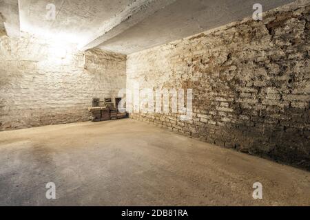 Abandoned empty old dark underground cellar. High quality photo Stock Photo