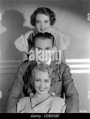 RUBY KEELER JAMES CAGNEY and JOAN BLONDELL posed publicity portrait for FOOTLIGHT PARADE 1933 director LLOYD BACON  musical numbers created and directed by BUSBY BERKELEY Warner Bros. Stock Photo