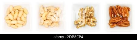 Collection of almonds cashew walnuts and pecan nuts in whit bowls Stock Photo