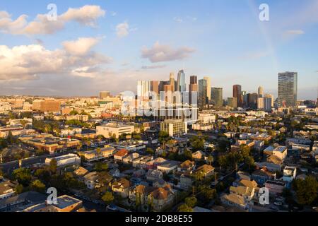 Arc of a faint rainbow over downtown Los Angeles as a storm clears Stock Photo