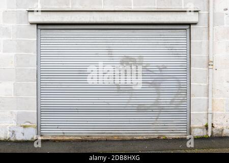 Metal roller security shutter, business shut down concept Stock Photo