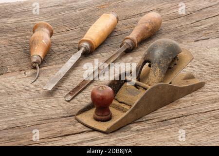 Carpenter tools for woodworking on rustic wooden board Stock Photo