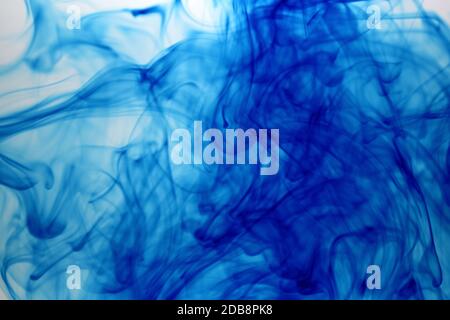 Food Coloring Drop in Water Abstract Texture Stock Photo