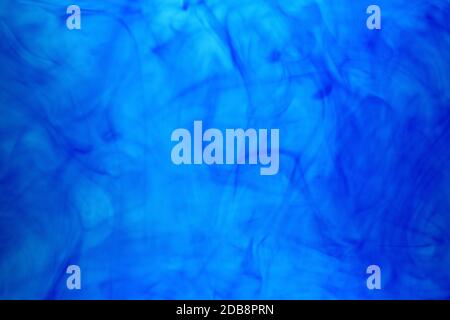 Food Coloring Drop in Water Abstract Texture Stock Photo