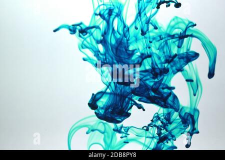 Blue Color drops in water background Stock Photo