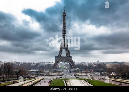 The famous Tour Eiffel at the end of winter under storm clouds