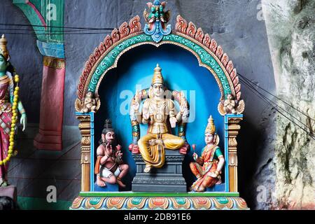 Colorful statue of Hindu God in Batu caves Indian Temple, Kuala Lumpur, Malaysia Stock Photo